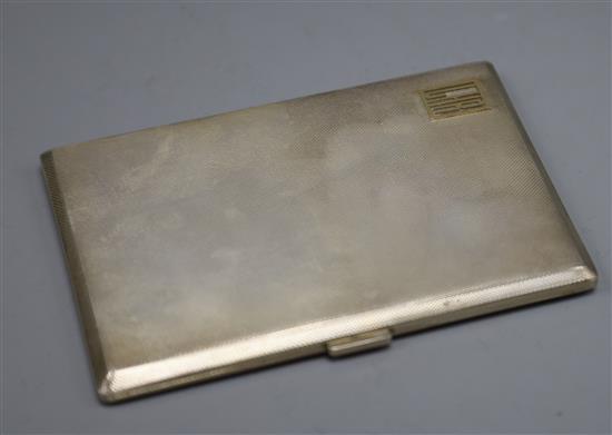 A 1950s engine turned silver cigarette case, 12.8cm.